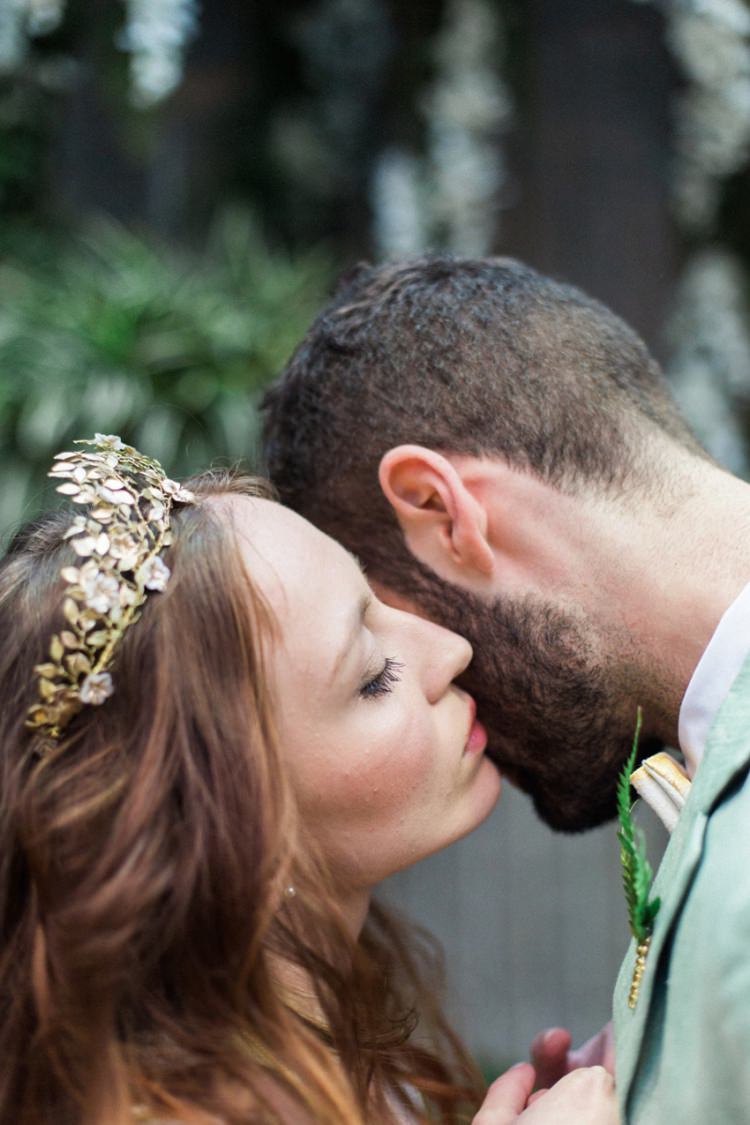 Conservatory Bride Fine Art Green Suit Foliage Buttonhole Gold Crown Headpiece | Greenery Botanical Wedding Ideas https://lisadigiglio.com/