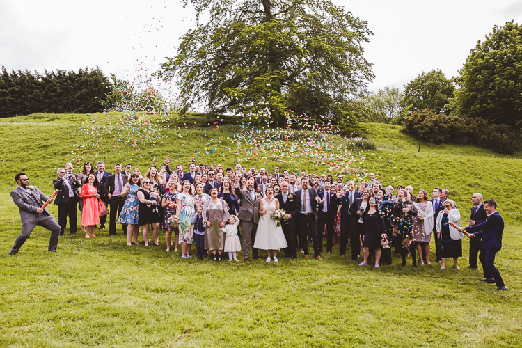 Confetti Cannons Brightly Coloured Mismatched Marquee Wedding http://www.nicolacasey.photography/