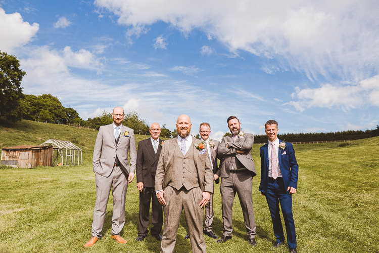 Brown Wool Suit Groom Brightly Coloured Mismatched Marquee Wedding http://www.nicolacasey.photography/