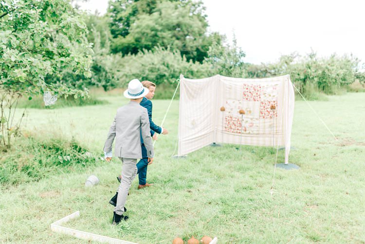 Coconut Shy Game Rustic Summer Country DIY Barn Wedding http://sarahjaneethan.co.uk/