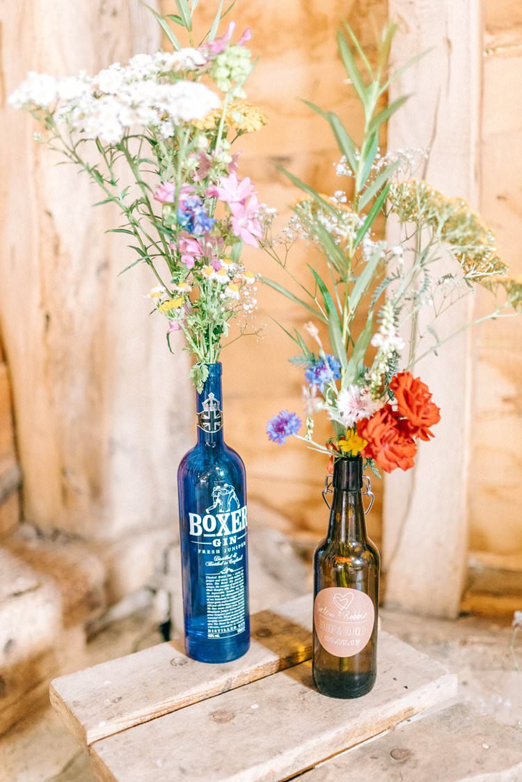 Bottle Gin Beer Flowers Decor Rustic Summer Country DIY Barn Wedding http://sarahjaneethan.co.uk/