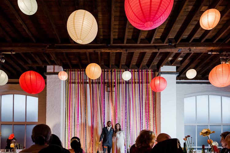Ribbon Multicolour Backdrop Paper Lanterns Bright Very Colourful Quirky Fun City Wedding London http://www.babbphoto.com/
