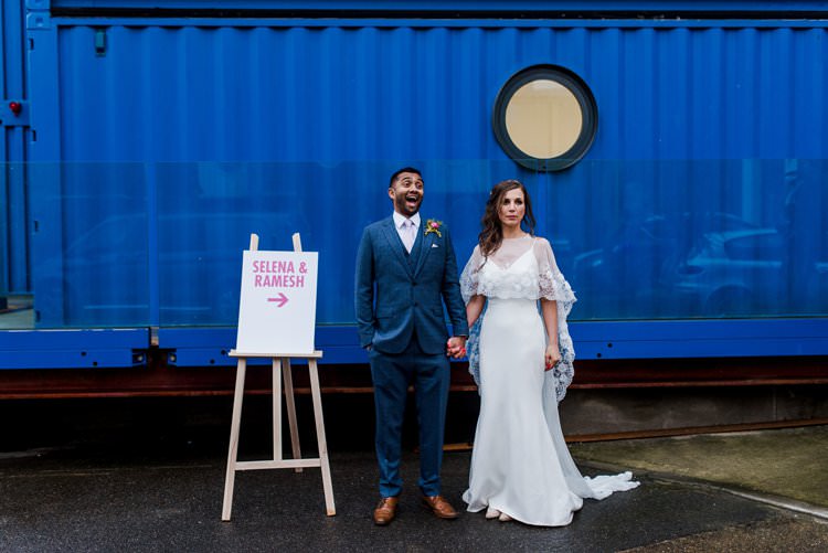 Bride Bridal Groom Couple Portrait Sign Direction Easel Bright Very Colourful Quirky Fun City Wedding London http://www.babbphoto.com/