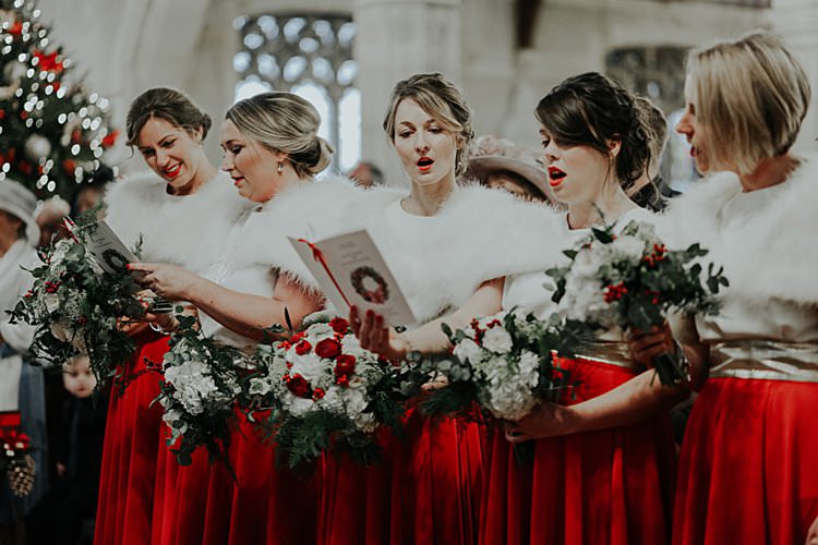 Bridesmaids Red Skirts Traditional Christmas Wedding Red Festive https://lolarosephotography.com/