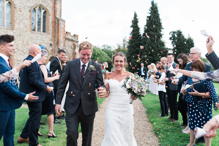 Bride Bridal Bardot Dress Gown Confetti Shot Grey Suit Groom Darling Hand Made Tipi Garden Wedding https://www.gemmagiorgio.com/