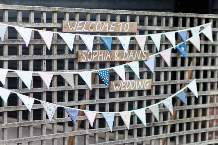 Welcome Sign Bunting Hand Painted Wooden Trellis Darling Hand Made Tipi Garden Wedding https://www.gemmagiorgio.com/