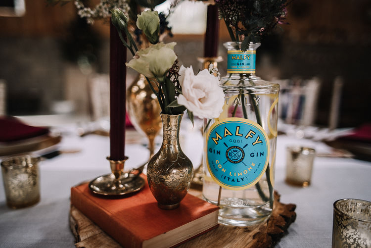 Centrepiece Decor Tables Books Flowers Bottles Candles Luxe Rustic Autumn Berry Wedding http://www.oobaloosphotography.co.uk/
