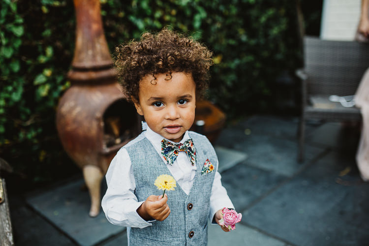 Page Boy Floral Bow Tie Waistcoat Colourful DIY Floral Luxe Barn Wedding http://www.joemather-photography.co.uk/