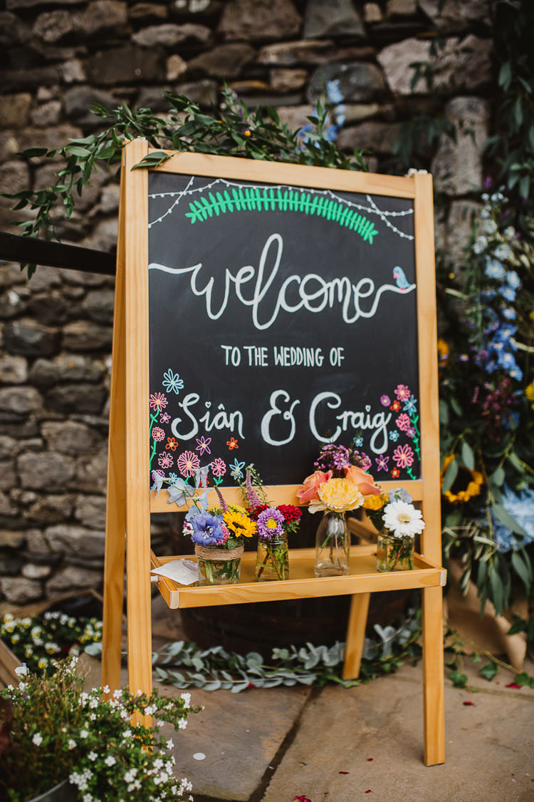 Welcome Sign Calligraphy Black Chalk Board Easel Colourful DIY Floral Luxe Barn Wedding http://www.joemather-photography.co.uk/