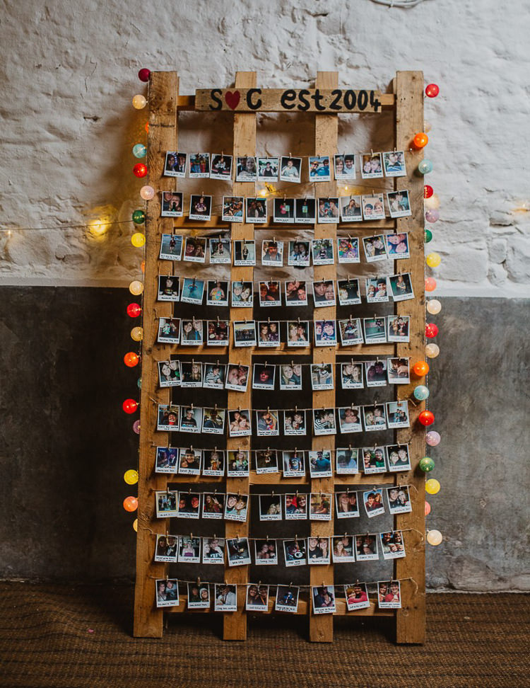 Photo Display Wooden Pallet Colourful DIY Floral Luxe Barn Wedding http://www.joemather-photography.co.uk/