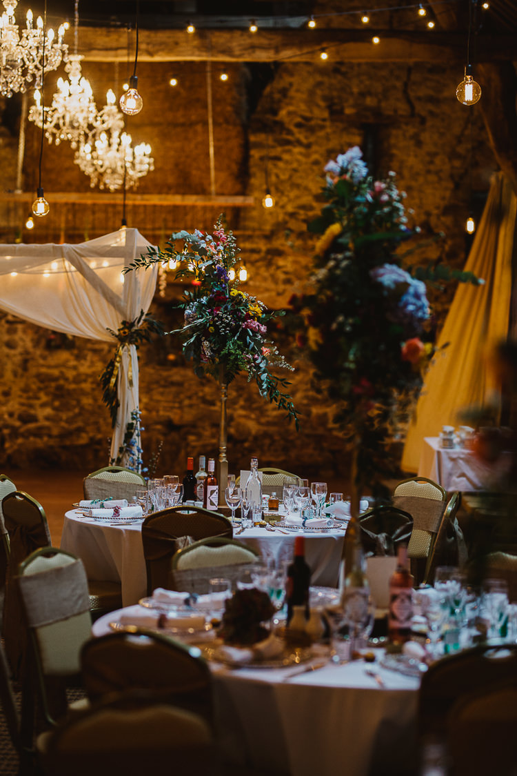 Flowers Tables Festoon Lights Decor Colourful DIY Floral Luxe Barn Wedding http://www.joemather-photography.co.uk/