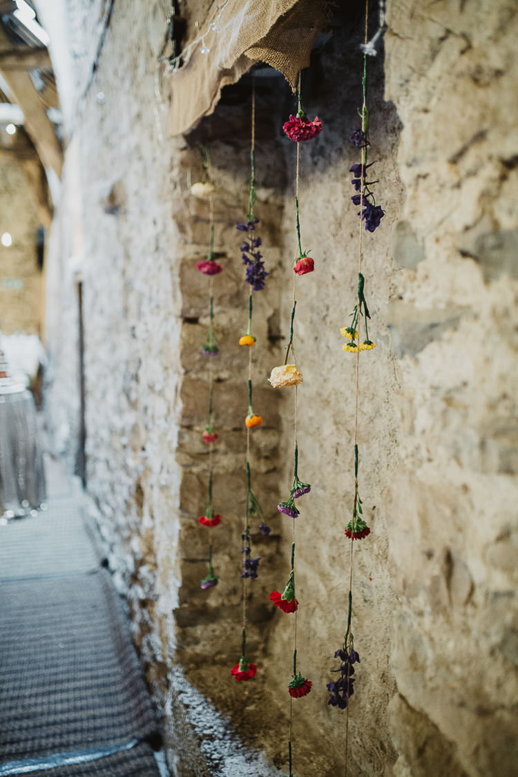 Hanging Flowers Wall Colourful DIY Floral Luxe Barn Wedding http://www.joemather-photography.co.uk/
