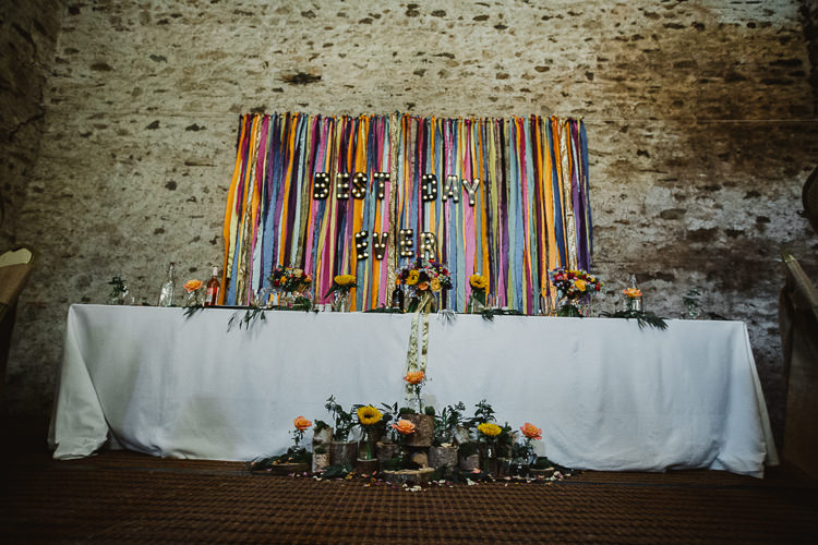 Ribbon Backdrop Top Table Decor Colourful DIY Floral Luxe Barn Wedding http://www.joemather-photography.co.uk/