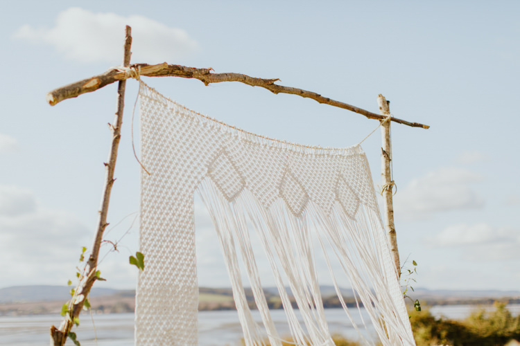 Macrame Backdrop Decor Bohemian Luxe Coastal Wedding Ideas https://www.tarastattonphotography.com/
