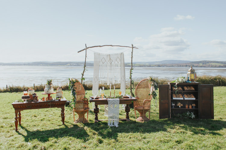 Peacock Chairs Macrame Backdrop Pampas Grass Greenery Tablescape Decor Bohemian Luxe Coastal Wedding Ideas https://www.tarastattonphotography.com/
