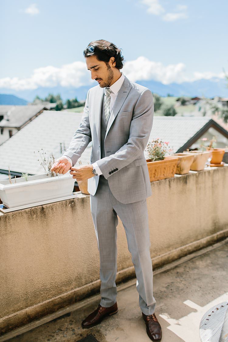 Destination Grey Suit Groom Cufflinks Stylish Green Tie Summer | Romantic Castle Switzerland Wedding http://kbalzerphotography.com/