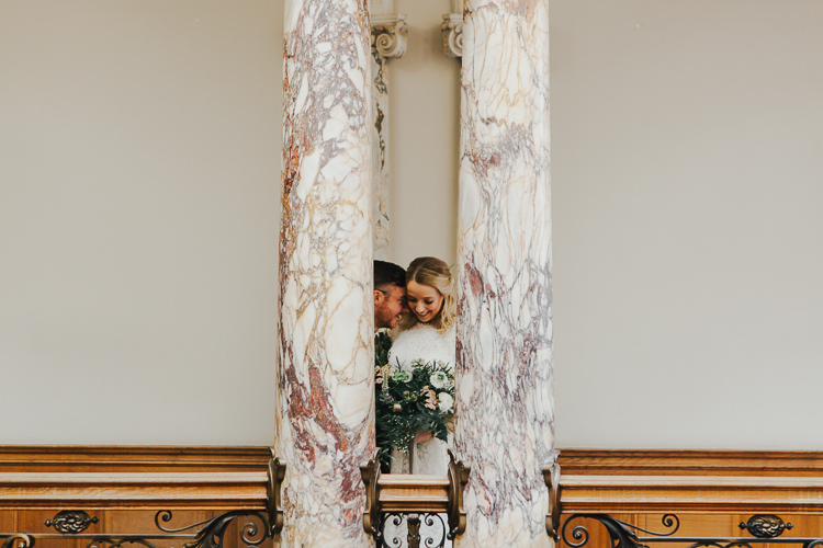 Wedding Civil Ceremony Town Hall Bride Grooms Embrace Marble Pillar | Cool Edinburgh City Elopement http://www.arcadiancity.co.uk/