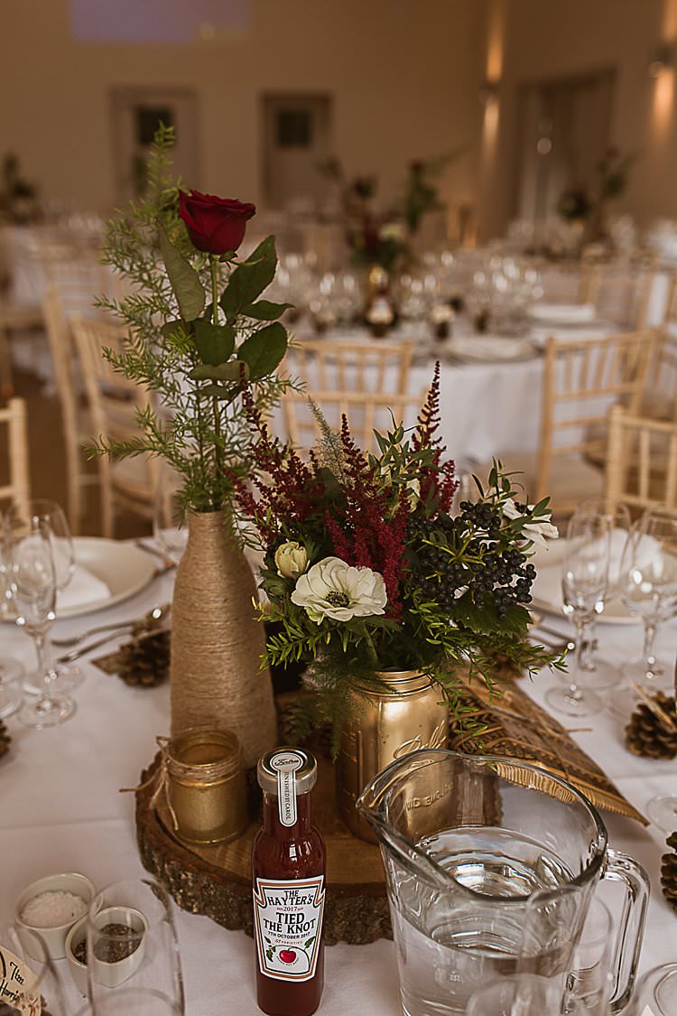 Centrepiece Decor Log Flowers Bottle Jar Gold Twine Beautiful Vibrant Dark Red Autumn Wedding http://thespringles.com/