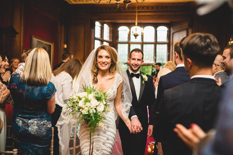 Bride Bridal Veil Dress Gown Embellished Fishtail Moss Bros Groom Navy Dinner Jacket Tuxedo Bow Tie Bouquet Greenery White Ribbon Gold Sequins Marble Greenery Vintage Glamour Wedding https://www.tobiahtayo.com/