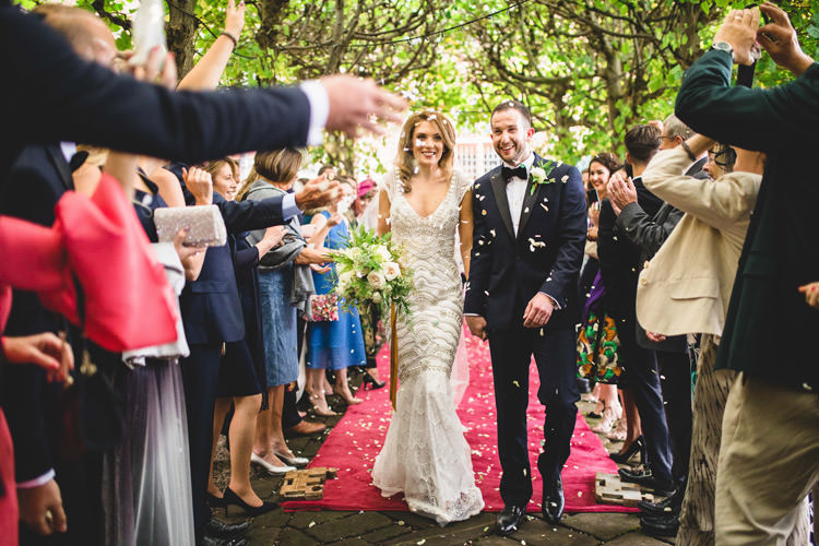 Bride Bridal Veil Dress Gown Embellished Fishtail Moss Bros Groom Navy Dinner Jacket Tuxedo Bow Tie Confetti Shot Gold Sequins Marble Greenery Vintage Glamour Wedding https://www.tobiahtayo.com/