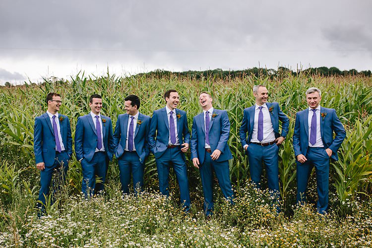 Blue Suits Purple Ties Groom Groomsmen Tropical Countryside Tipi Wedding https://parkershots.com/