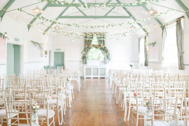 Fairy Lights Paper Leaf Garlands Ceremony Room Light Airy Pretty Pastel Pink Wedding http://whitestagweddings.com/