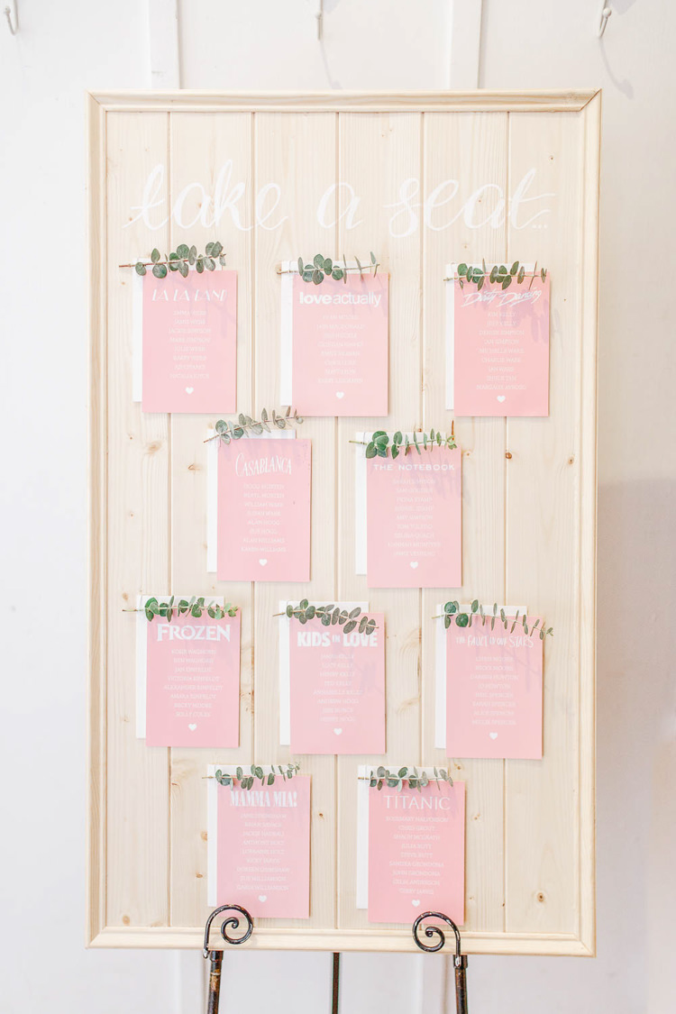 Wooden Seating Plan Table Chart Films Movies Light Airy Pretty Pastel Pink Wedding http://whitestagweddings.com/
