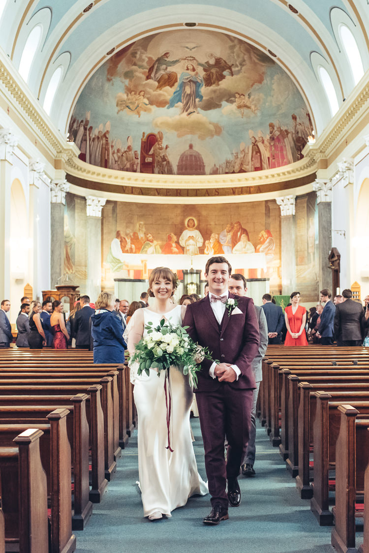 Bride Groom Ceremony Walk Down Aisle Recessional Bouquet Church Dome | Greenery Burgundy City Autumn Wedding http://lisahowardphotography.co.uk/