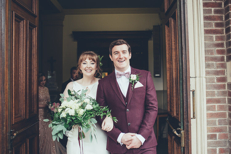 Bride Groom After Ceremony Church Bright Happy Airy Foliage Bouquet | Greenery Burgundy City Autumn Wedding http://lisahowardphotography.co.uk/