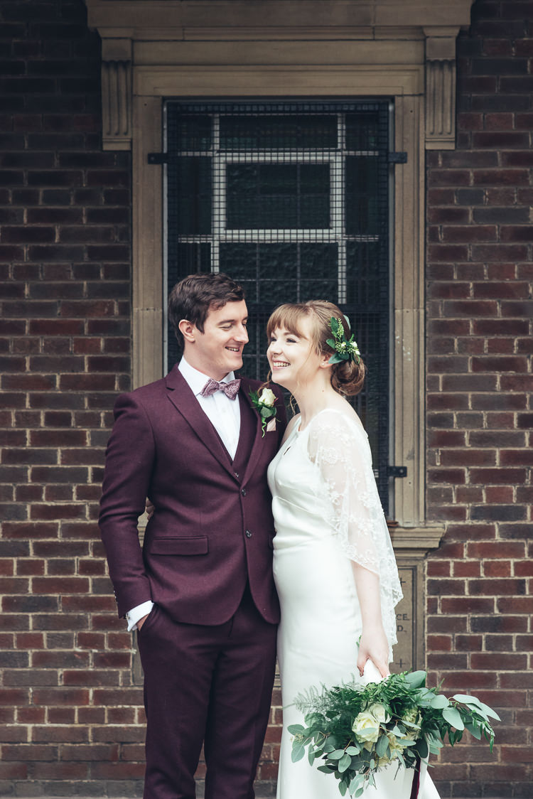 Bride Groom Photos After Ceremony Romantic Industrial Brick Building Wild Foliage Bouquet | Greenery Burgundy City Autumn Wedding http://lisahowardphotography.co.uk/