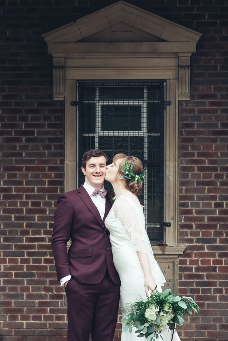 Bride Groom Kiss After Ceremony Romantic Industrial Brick Building Foliage Bouquet | Greenery Burgundy City Autumn Wedding http://lisahowardphotography.co.uk/