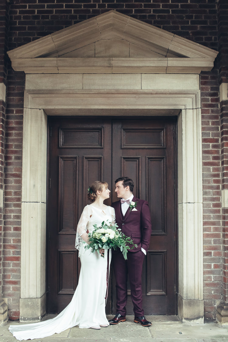 Bride Groom Photos After Ceremony Romantic Industrial Brick Building Wild Foliage Bouquet | Greenery Burgundy City Autumn Wedding http://lisahowardphotography.co.uk/