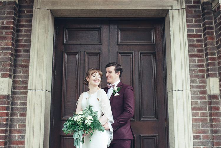 Bride Groom Photos After Ceremony Romantic Industrial Brick Building Wild Foliage Bouquet | Greenery Burgundy City Autumn Wedding http://lisahowardphotography.co.uk/