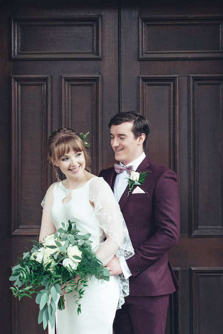 Bride Groom Photo Bouquet Burgundy Suit Caped Keyhole Dress Updo | Greenery Burgundy City Autumn Wedding http://lisahowardphotography.co.uk/
