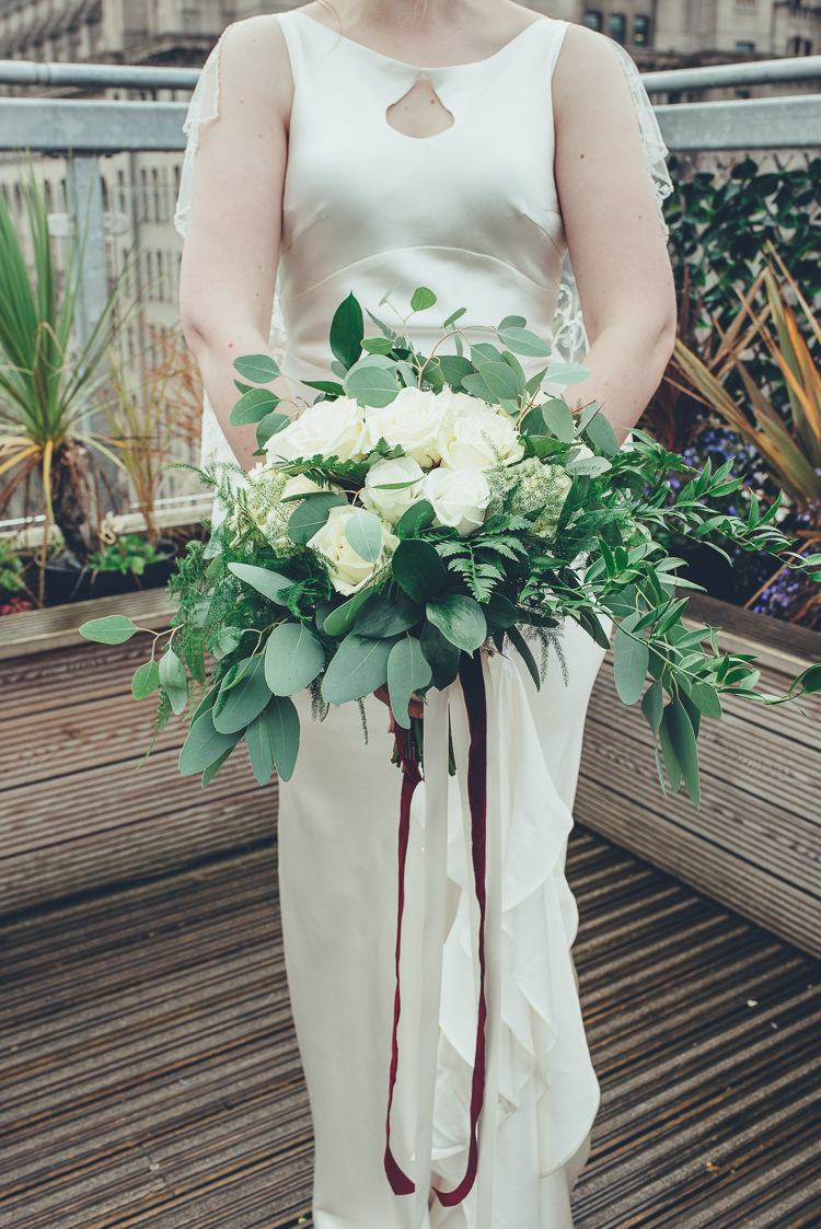 Bride Caped Silk Dress Wild Foliage White Bouquet Ribbon Relaxed Industrial | Greenery Burgundy City Autumn Wedding http://lisahowardphotography.co.uk/