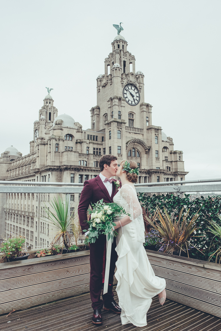 Bride Groom Romantic Kiss Photo Cityscape Terrace View Liverpool | Greenery Burgundy City Autumn Wedding http://lisahowardphotography.co.uk/