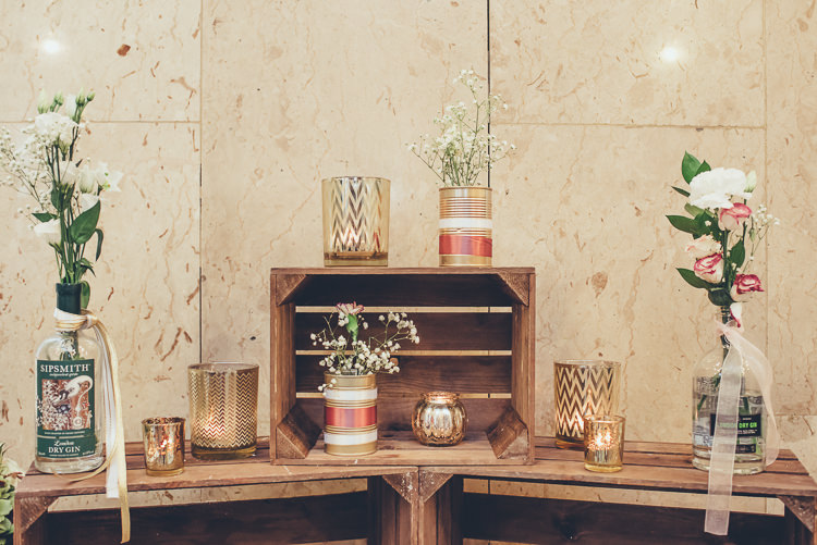 Rustic Industrial Romantic Decor Gin Bottle Tin Cans Roses Baby's Breath Crates | Greenery Burgundy City Autumn Wedding http://lisahowardphotography.co.uk/
