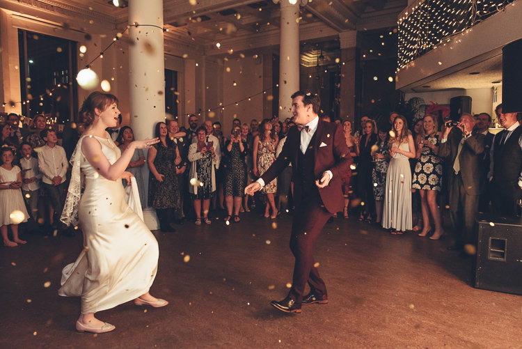 Bride Groom Funny First Dance Fast Twirl Fairy Lights Indoor Reception Confetti | Greenery Burgundy City Autumn Wedding http://lisahowardphotography.co.uk/