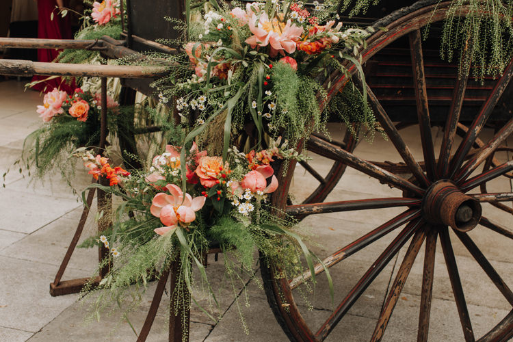 Flower Arrangement Coral Peonies Cart Orange Country Barn Wedding http://www.meganduffield.com/