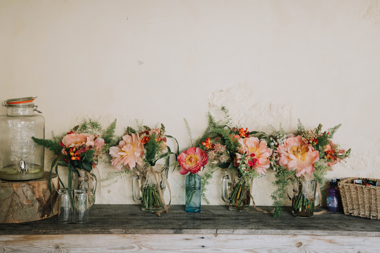Bottle Flowers Peony Pink Orange Country Barn Wedding http://www.meganduffield.com/