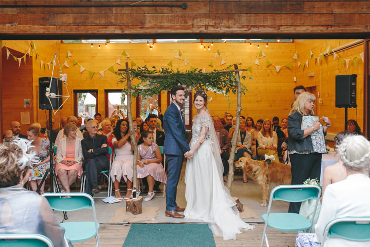 Floral Arch Branch Backdrop Ceremony Happy DIY Woodland Wedding http://www.elliegracephotography.co.uk/