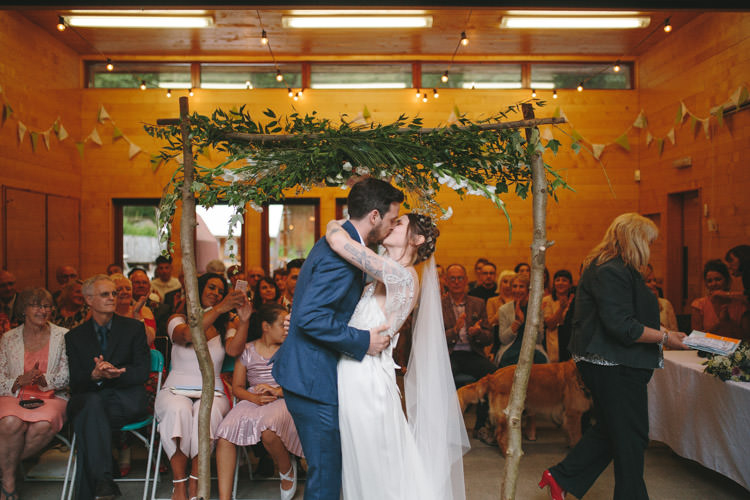 Floral Arch Branch Backdrop Ceremony Happy DIY Woodland Wedding http://www.elliegracephotography.co.uk/