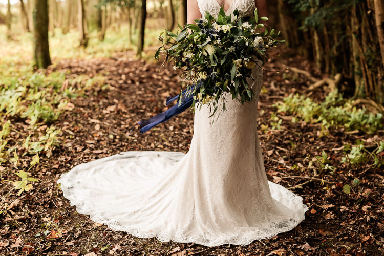 Bouquet Flowers Bride Bridal Greenery Thistle Ranunculus Magical Fairy Lit Blue Gold Winter Wedding Ideas https://sarahbrookesphotography.com/