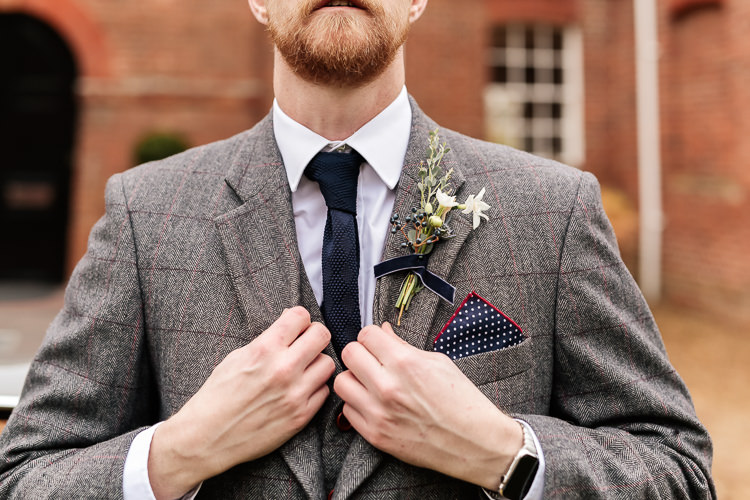 Groom Grey Tweed Suit Buttonhole Tie Magical Fairy Lit Blue Gold Winter Wedding Ideas https://sarahbrookesphotography.com/