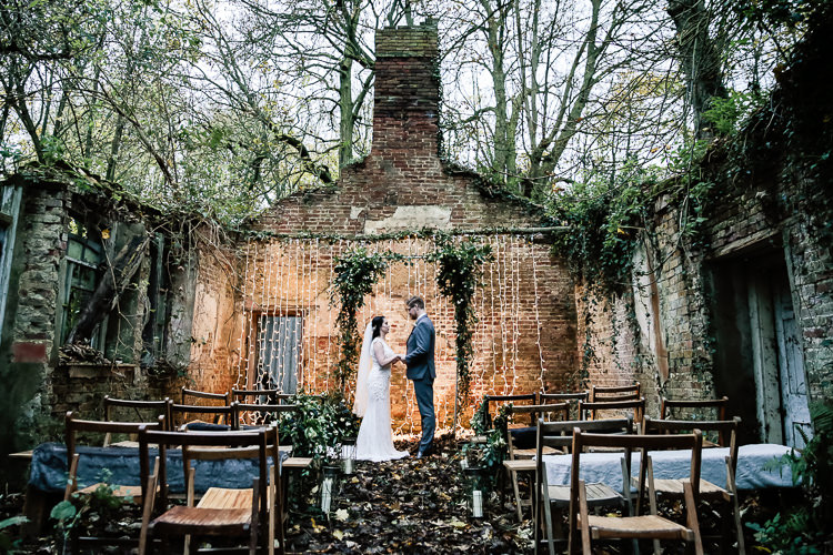 Backdrop Flowers Lighting Decor Arch Arbour Magical Fairy Lit Blue Gold Winter Wedding Ideas https://sarahbrookesphotography.com/