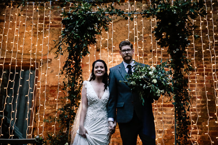 Backdrop Flowers Lighting Decor Arch Arbour Magical Fairy Lit Blue Gold Winter Wedding Ideas https://sarahbrookesphotography.com/