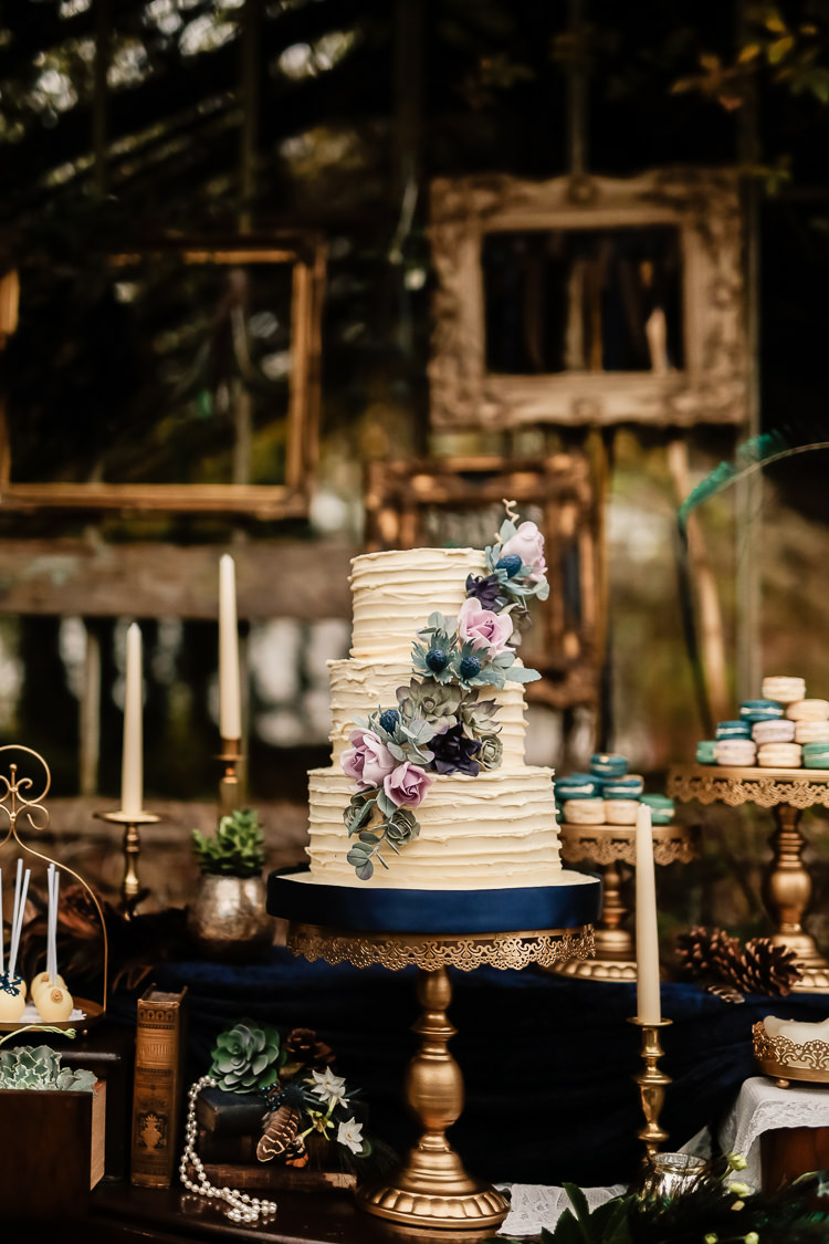 Buttercream Cake Floral Flowers Stand Magical Fairy Lit Blue Gold Winter Wedding Ideas https://sarahbrookesphotography.com/