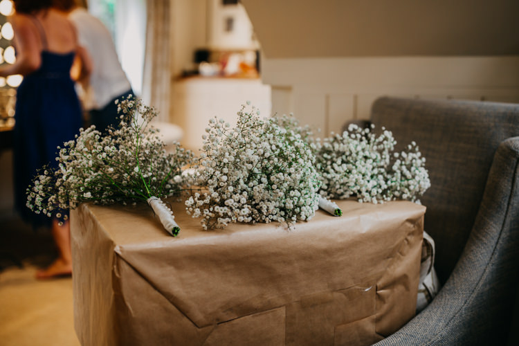 Gypsophila Bridesmaid Bouquets White Baby's Breath Flowers | Rustic Relaxed Cornflower Blue Barn Wedding http://www.peterhugophotography.com/