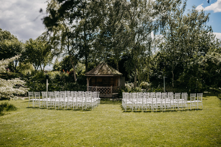 South Farm Cambridgeshire Outdoor Ceremony Aisle Countryside Woodland | Rustic Relaxed Cornflower Blue Barn Wedding http://www.peterhugophotography.com/