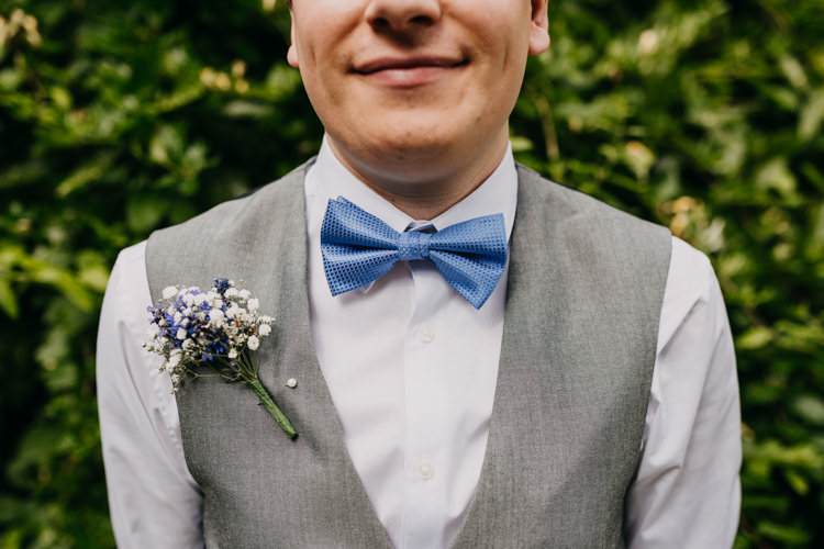 Groom Bow Tie Buttonhole Boutonniere Grey White Gypsophila | Rustic Relaxed Cornflower Blue Barn Wedding http://www.peterhugophotography.com/